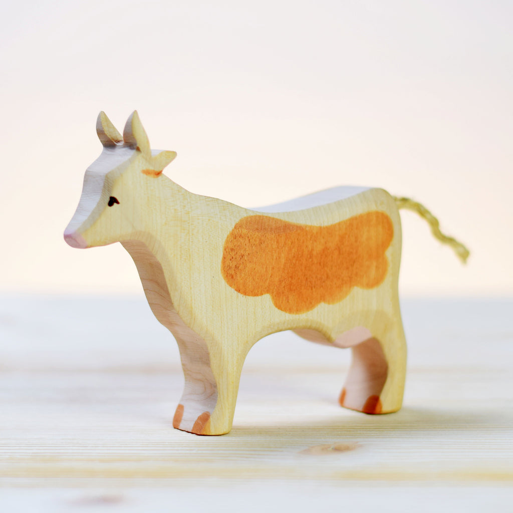 Mucca bianca e marrone in legno Bumbutoys - Shop Millemamme